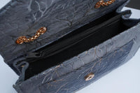 Woman's velvet Textured purse with chain
