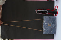 Woman's velvet Textured purse with chain