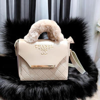 Festive beige crossbaby bag for girls